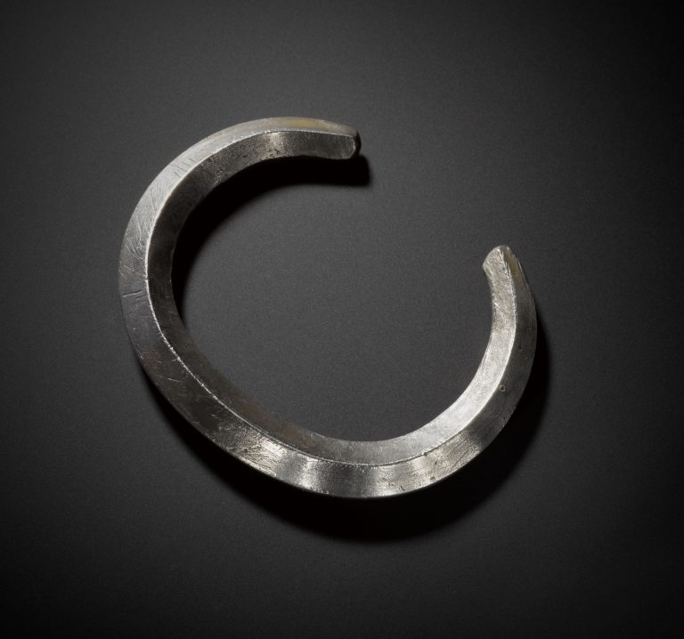 A silver arm ring from the Burray Hoard. Image © National Museums Scotland